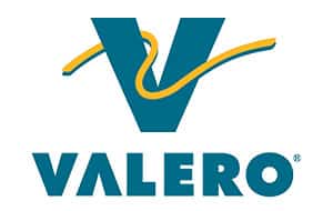 The Valero logo features a large teal letter "V" with a flowing yellow line that wraps around it. The name "VALERO" is printed below in a bold, blue font. The logo is designed to convey a professional and recognizable brand identity.