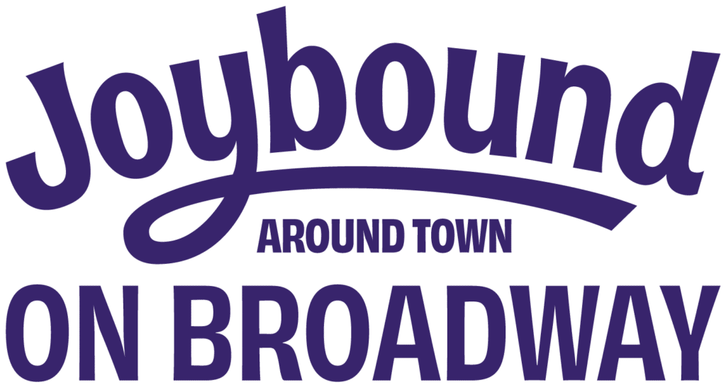 The image features the text "Joybound Around Town ON BROADWAY" in a stylized font. The words "Joybound" and "Around Town" are in purple, and "ON BROADWAY" is bold and also in purple, emphasizing the theme of joy and community on Broadway.