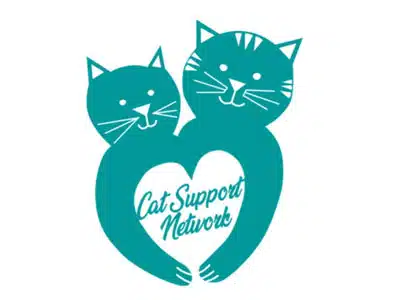 A teal illustration featuring two stylized cats embracing, forming a heart shape between them. The text "Cat Support Network" is displayed within the heart. The design emphasizes a welcoming and supportive theme related to cats.