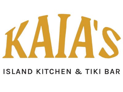 Logo for Kaia's Island Kitchen & Tiki Bar, featuring the name 'KAIA'S' in large yellow letters at the top and the phrase 'ISLAND KITCHEN & TIKI BAR' in smaller black letters below.