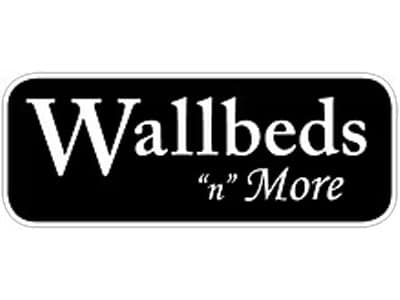 A logo featuring the text "Wallbeds "n" More" in large white font on a black rectangular background. The logo emphasizes the name of the business, highlighting its focus on wallbeds and related products.
