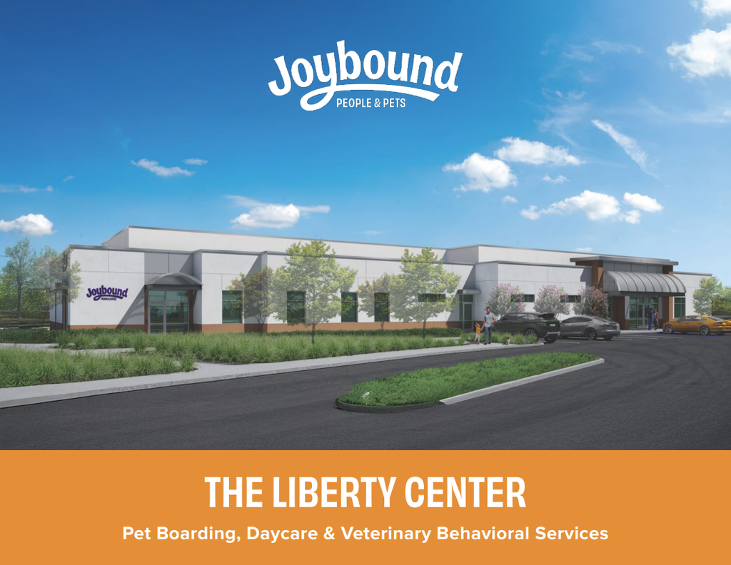 A rendering of the Joybound People & Pets Liberty Center building, with parked cars, trees, and a curved driveway, above the text "The Liberty Center" and "Pet Boarding, Daycare & Veterinary Behavioral Services."